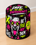 Dare to Be Different round printed ottoman featuring bold neon pink, green and black graffiti artwork with motivational lettering
