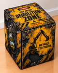 Demolition square printed ottoman featuring rugged industrial artwork in bold orange and black