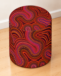 Blind Eye 003 round printed ottoman featuring rich red and earthy abstract artwork