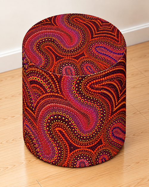 Blind Eye 003 round printed ottoman featuring rich red and earthy abstract artwork