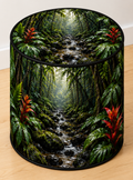 Rainforest round printed ottoman featuring deep green foliage, moss-covered trees and lush botanical details